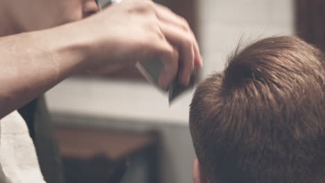 Barber-haircut.-Hairdressing.-Man-hairstyle.-Man-getting-haircut